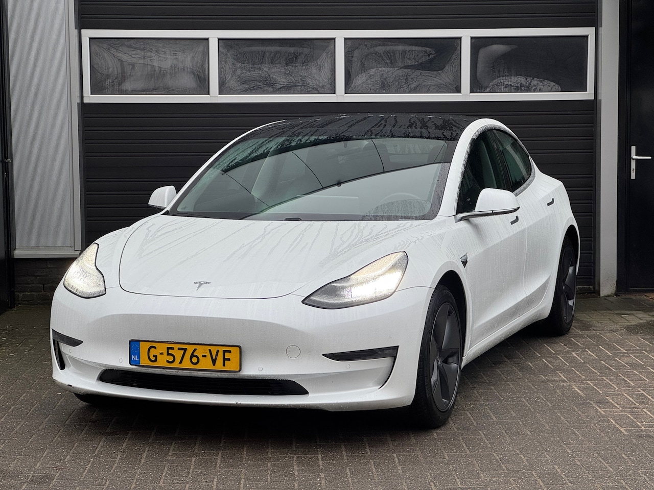 Tesla Model 3 - Long Range RWD Long Range AWD 75 kWh BTW AUTO, Panorama, Auto Pilot, NAP - AutoWereld.nl