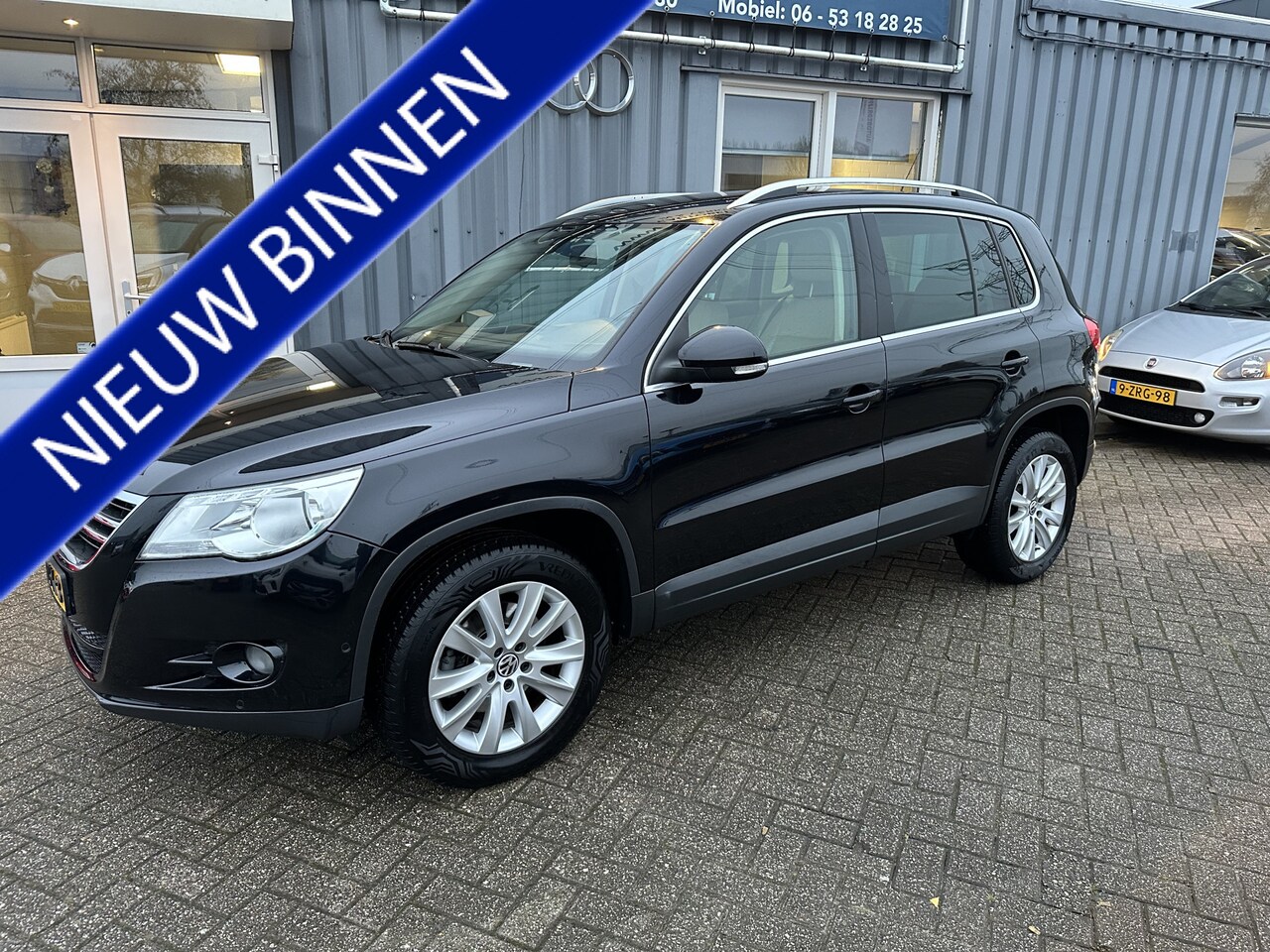 Volkswagen Tiguan - 1.4 TSI Sport&Style leer - AutoWereld.nl