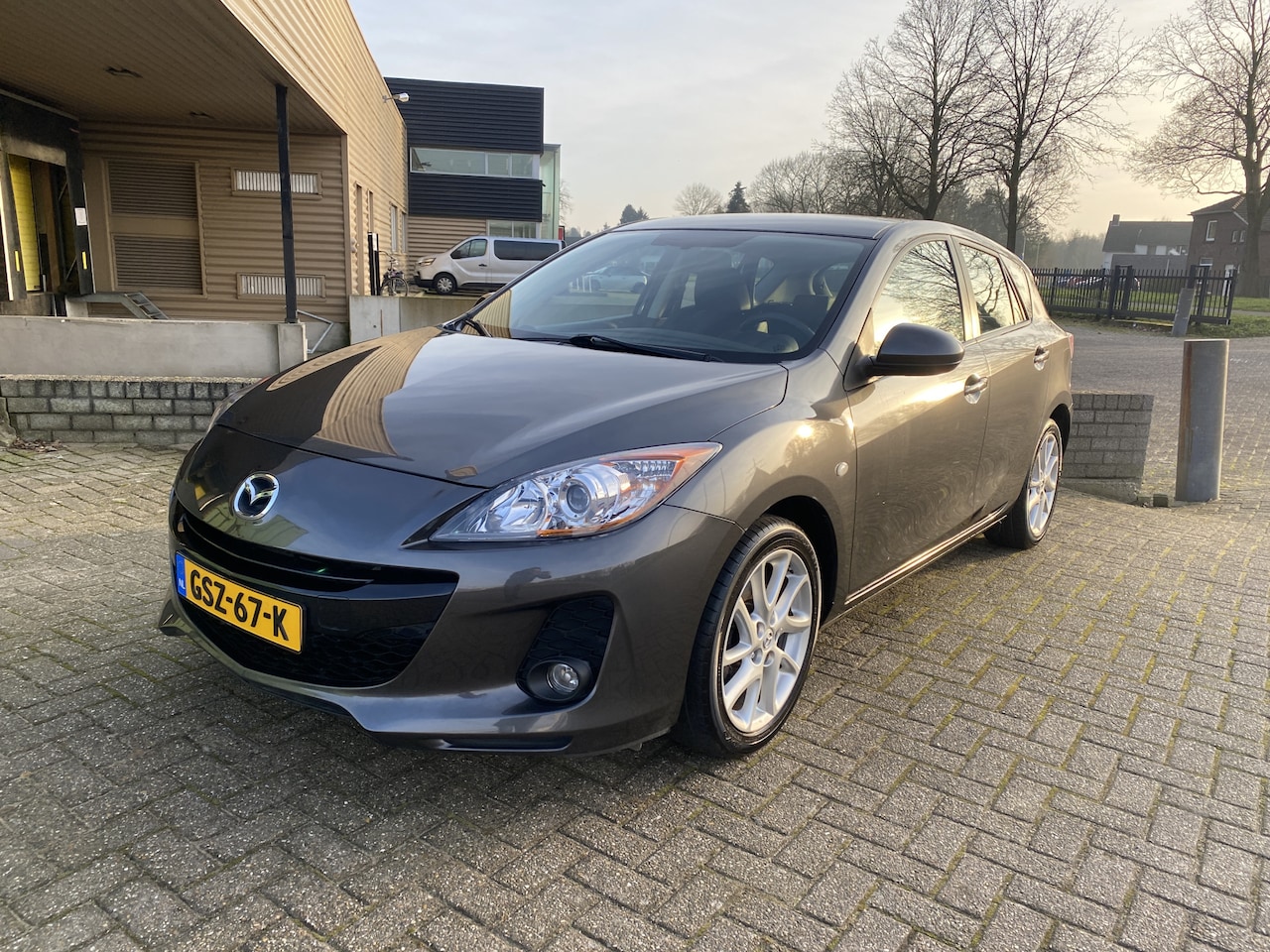 Mazda 3 - 2.0 DiSi GT-M [ leer,navi,lmv,cruise,xenon ] - AutoWereld.nl