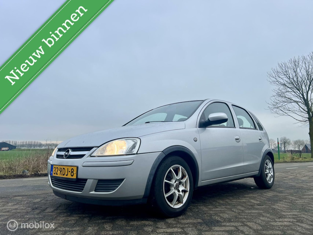 Opel Corsa - 1.2-16V Enjoy 1.2-16V Enjoy, BJ 2004, Lage km NAP, Zuinig, APK - AutoWereld.nl