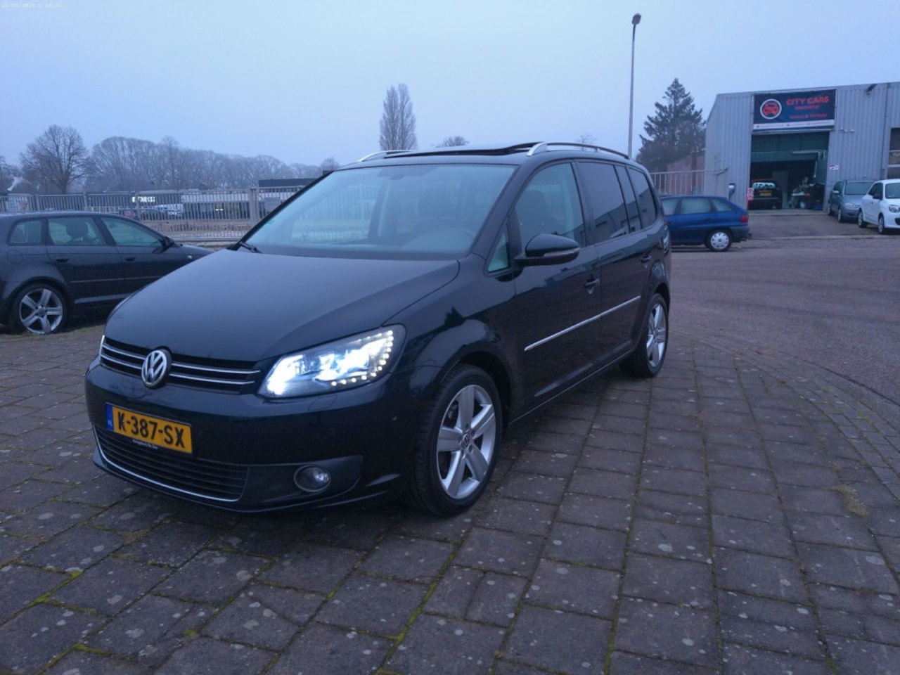 Volkswagen Touran - 1.4 TSI Highline 1.4 TSI HIGHLINE - AutoWereld.nl