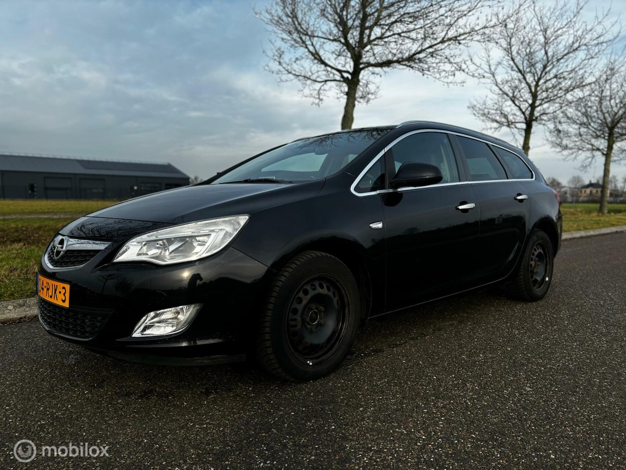 Opel Astra Sports Tourer - 1.7 CDTi Cosmo 2011 AIRCO - AutoWereld.nl