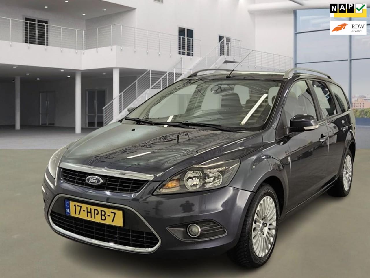 Ford Focus Wagon - 1.6 Titanium/NAVI/PSENSOR/TREKHAAK/CRUISE/AIRCO - AutoWereld.nl