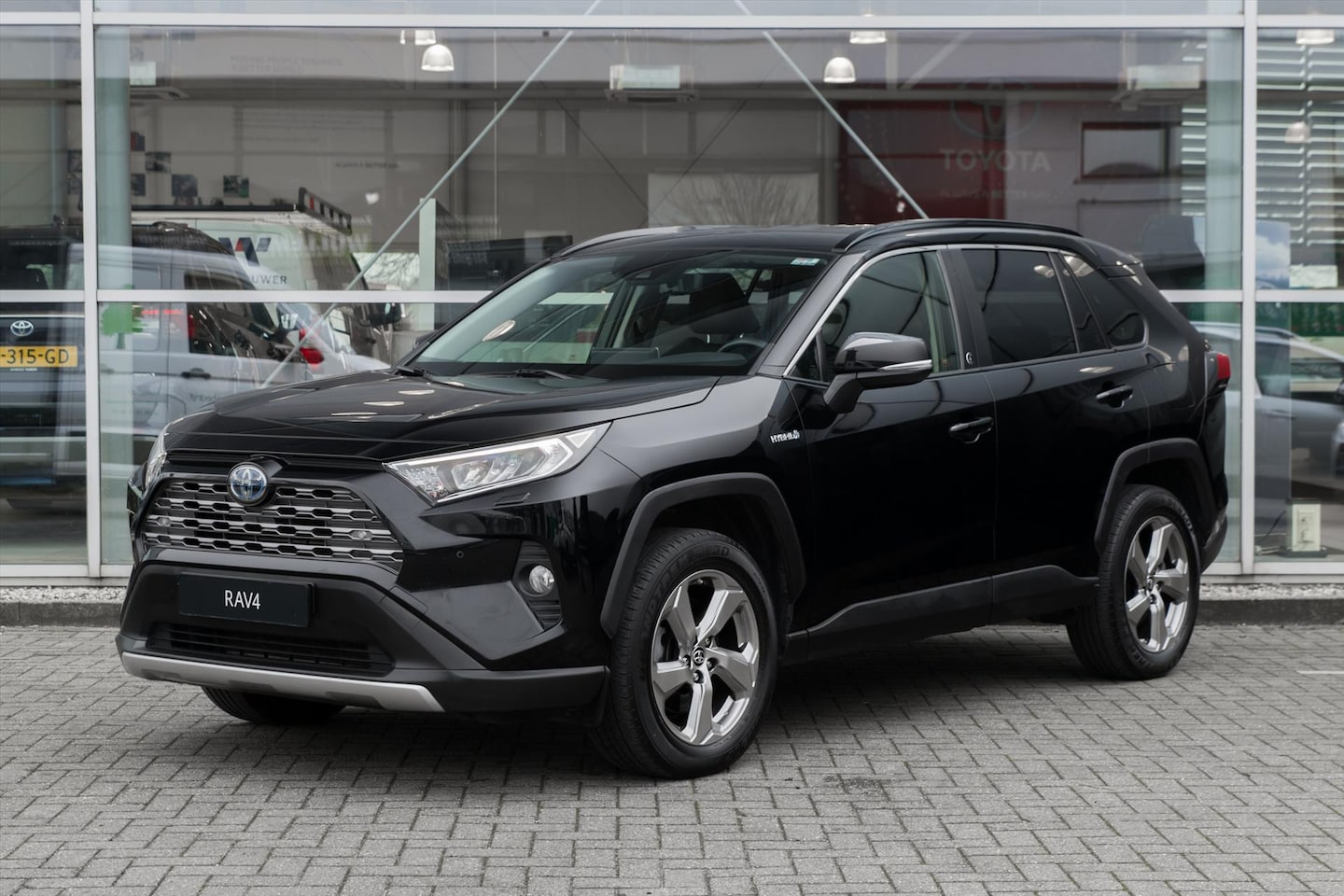 Toyota RAV4 - 2.5 Hybrid Team D 222pk AWD Stoel + Stuur Verwarming - AutoWereld.nl