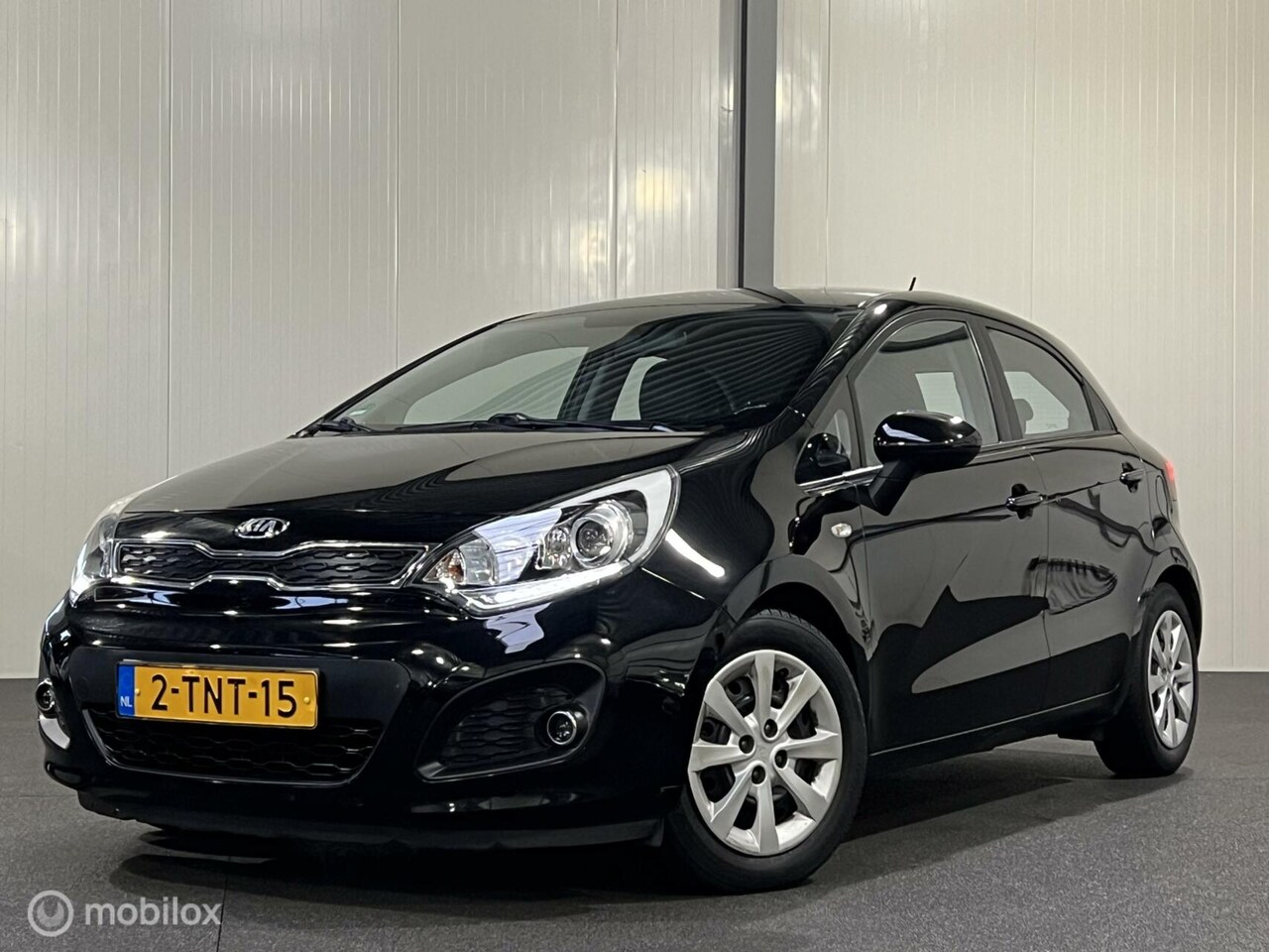 Kia Rio - 1.2 CVVT BusinessLine 5-drs [ NAP cruise airco ] - AutoWereld.nl