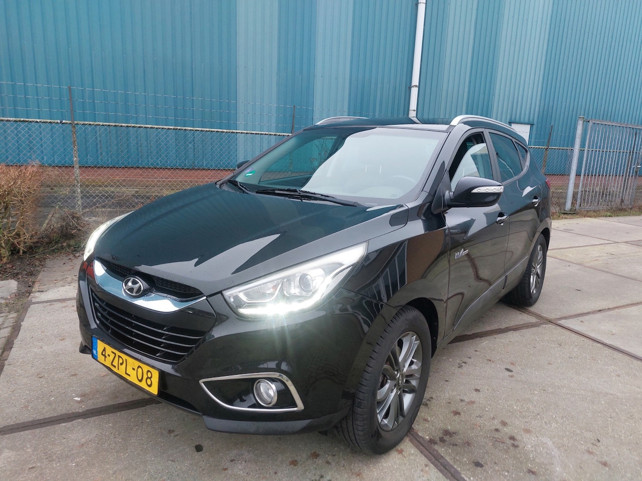 Hyundai ix35 - 1.6i GDI Business Edition Airco/ECC/NAV/LMV - AutoWereld.nl