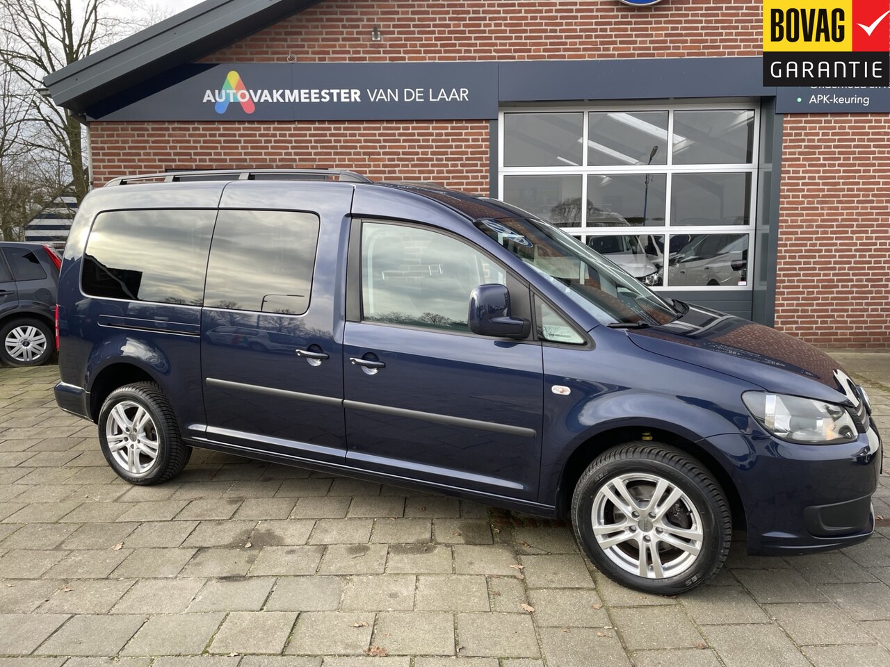 Volkswagen Caddy Maxi - 1.2 TSI Trendline 77kw Life 5 pers. DEURTJES ( Navigatie, Trekhaak, Cruise control) RIJKLA - AutoWereld.nl