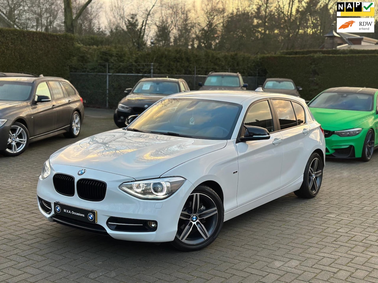 BMW 1-serie - 116i EDE Executive Sport|Nwe Ketting + Klepseals|Leder|Groot Navi|Climate control|Cruise c - AutoWereld.nl