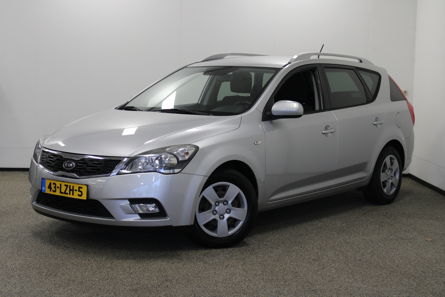 Kia Cee'd - 1.4 CVVT Seven Business Cruise|Clima|Navi - AutoWereld.nl