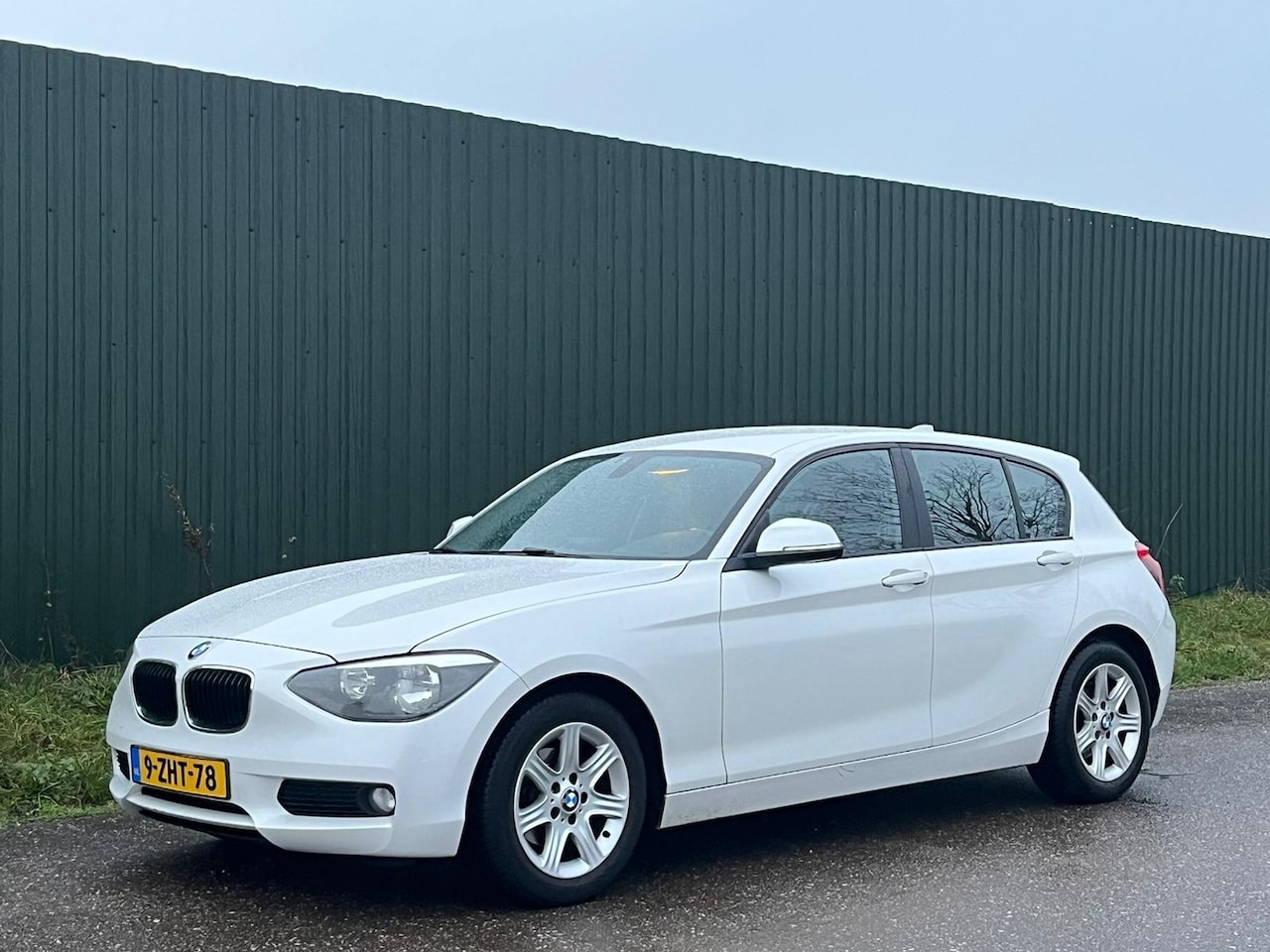 BMW 1-serie - 118d Executive Navipro AUT LEER - AutoWereld.nl