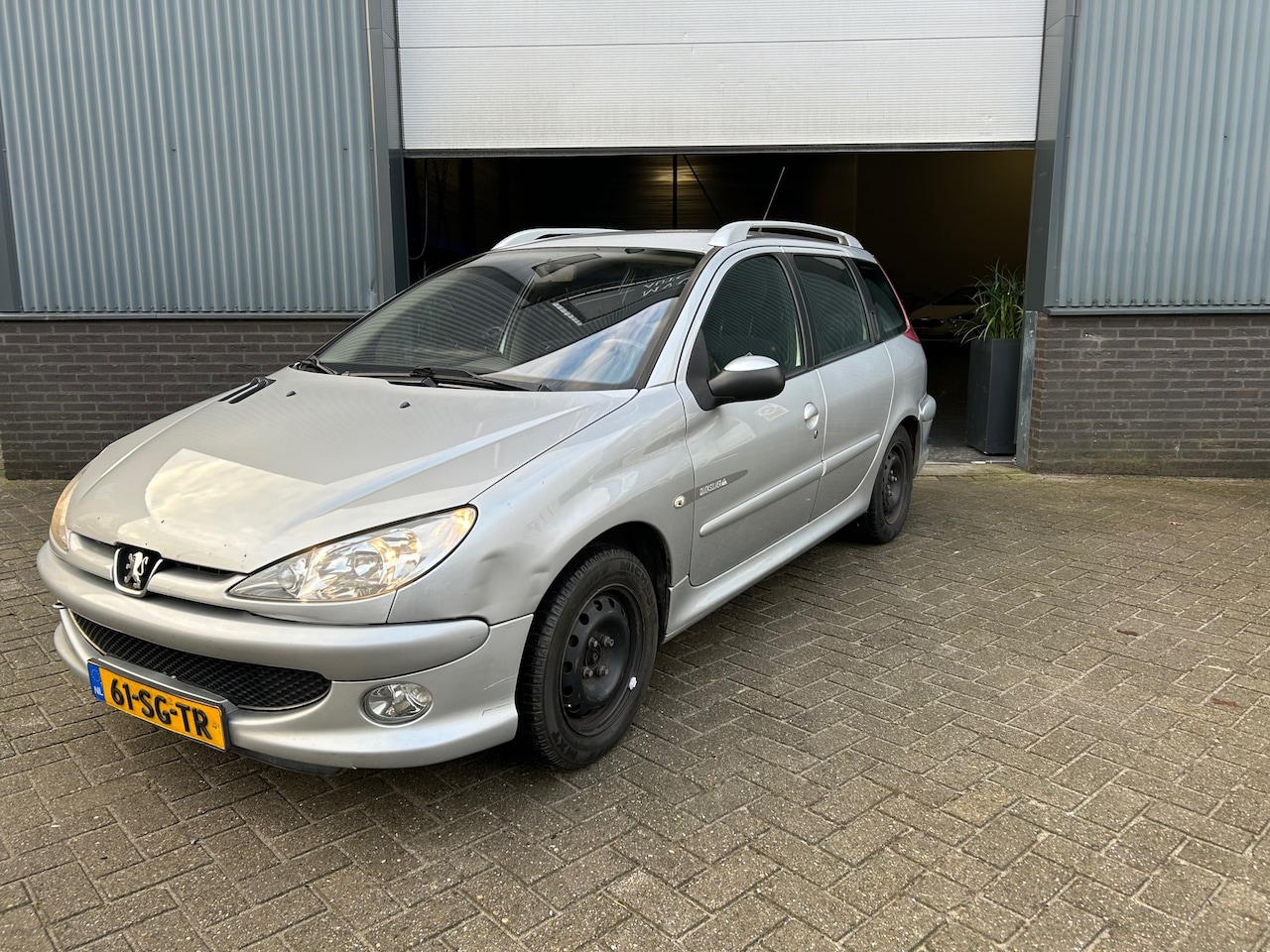 Peugeot 206 SW - 1.6-16V Quiksilver 1.6-16V Quiksilver - AutoWereld.nl