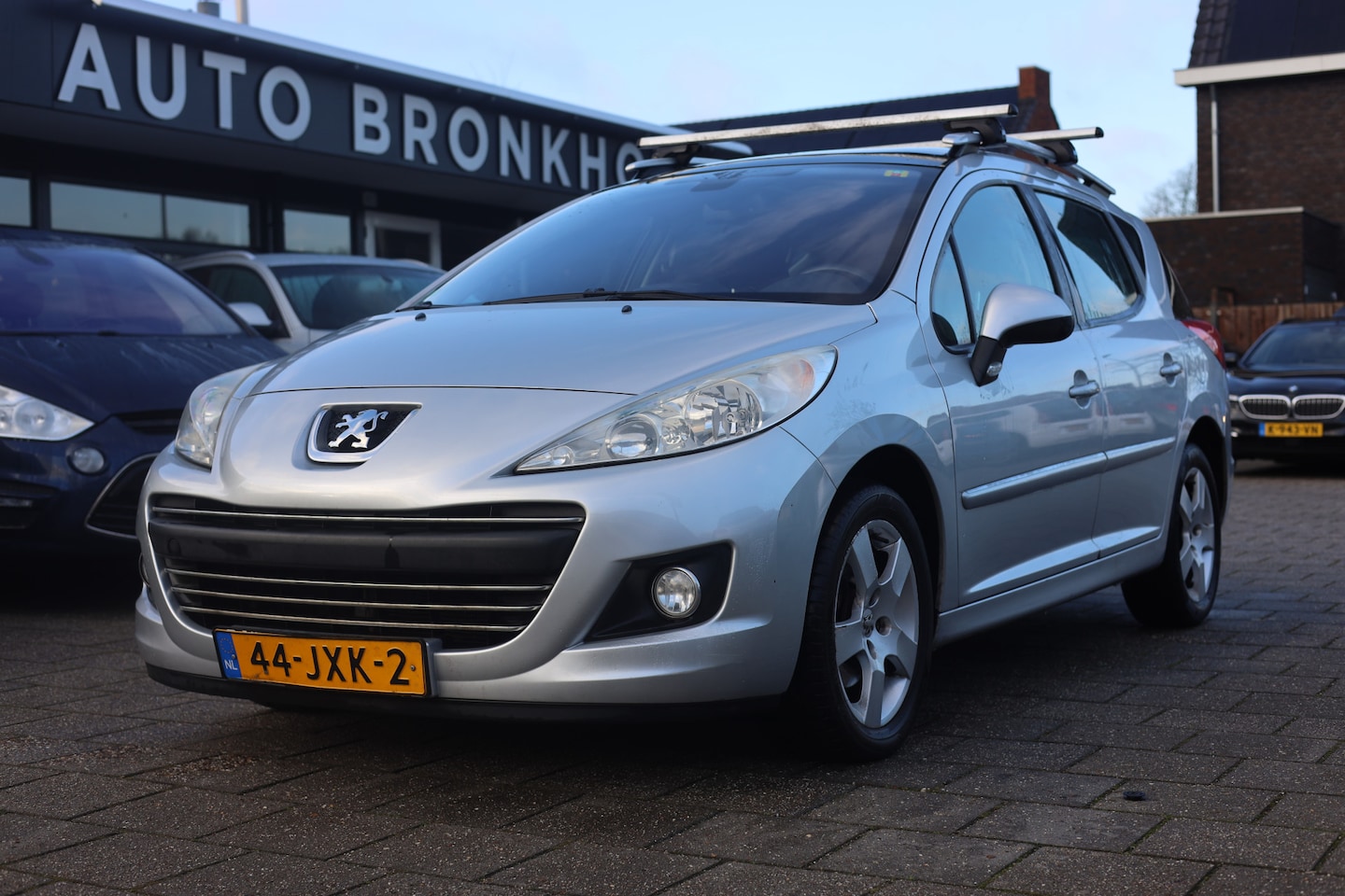 Peugeot 207 SW - 1.6 VTi PREMIERE | PANO | CLIMA | CRUISE | TREKHAAK - AutoWereld.nl