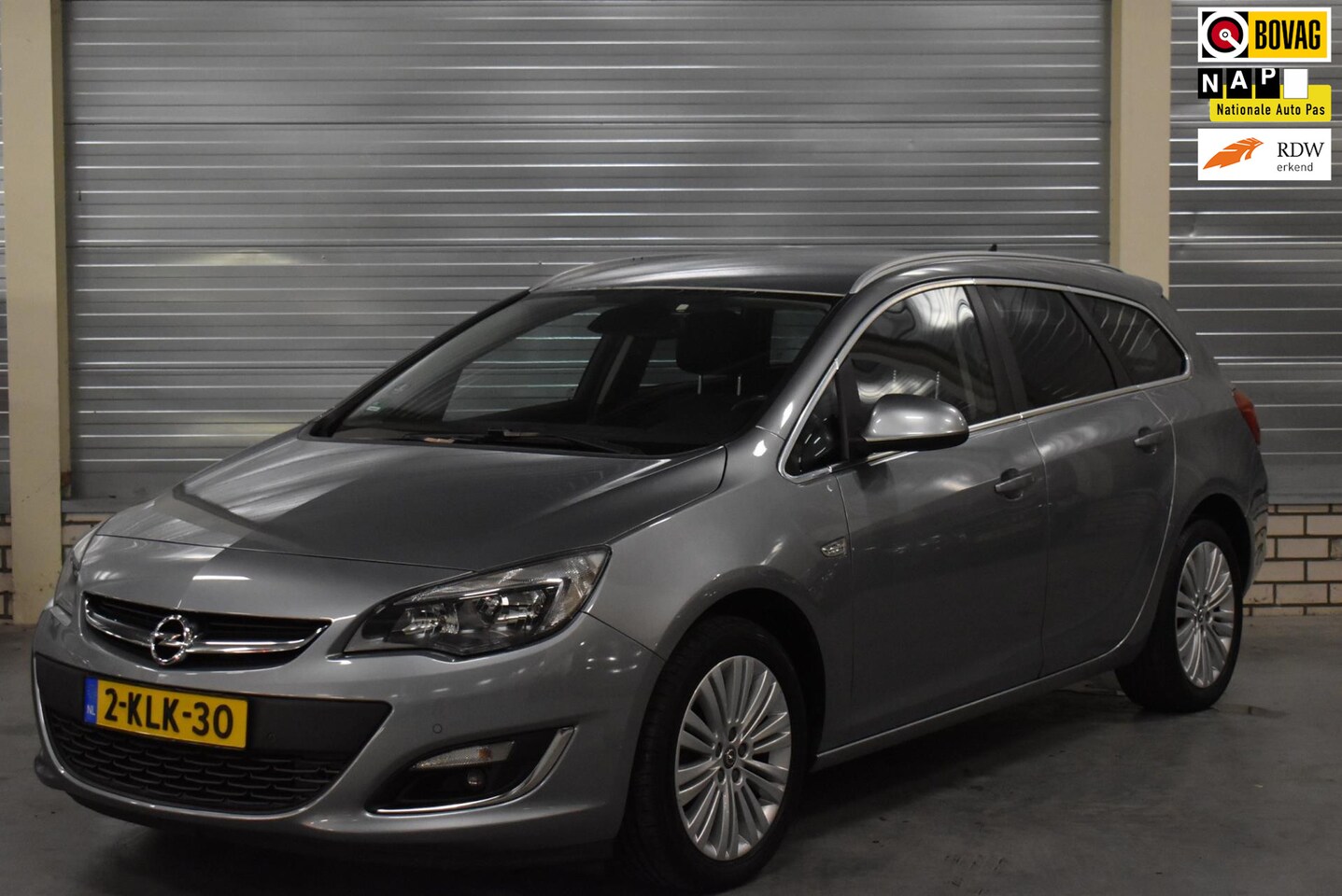 Opel Astra Sports Tourer - 1.4 Turbo Design Edition + Navigatie|Bluetooth|Parkeersensoren|Trekhaak| - AutoWereld.nl