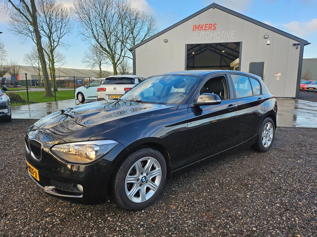 BMW 1-serie - 116i Business AUT - AutoWereld.nl