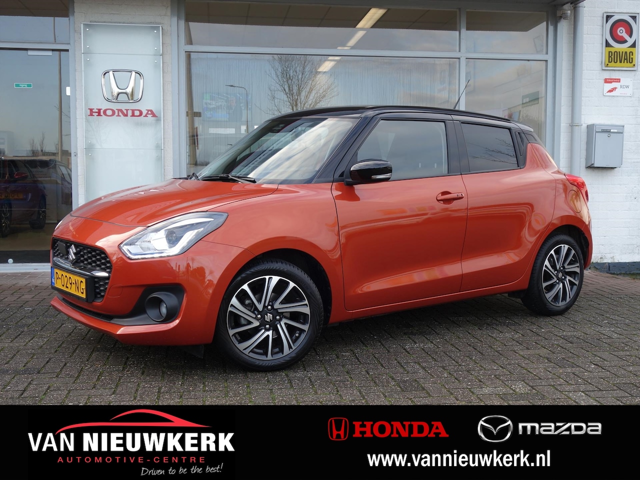 Suzuki Swift - 1.2 Smart Hybrid Style | Navi | Camera | Adapt. Cruise Control | Stoelverwarming - AutoWereld.nl