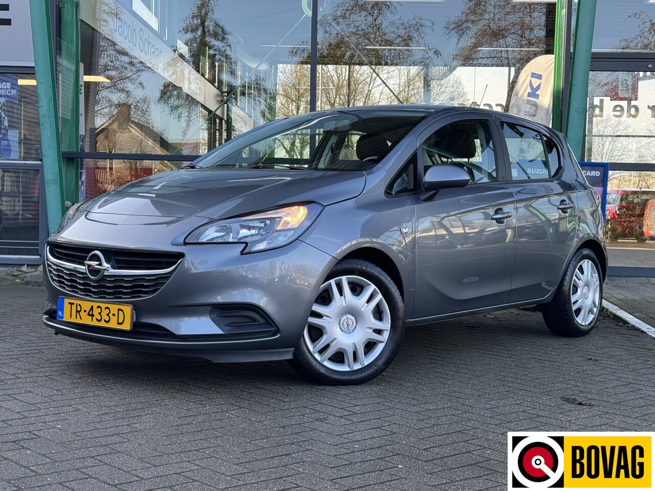 Opel Corsa - 1.4 Favourite | Incl. volledig AFLEVERPAKKET t.w.v. €600 | Airco | Cruise Control | Achter - AutoWereld.nl