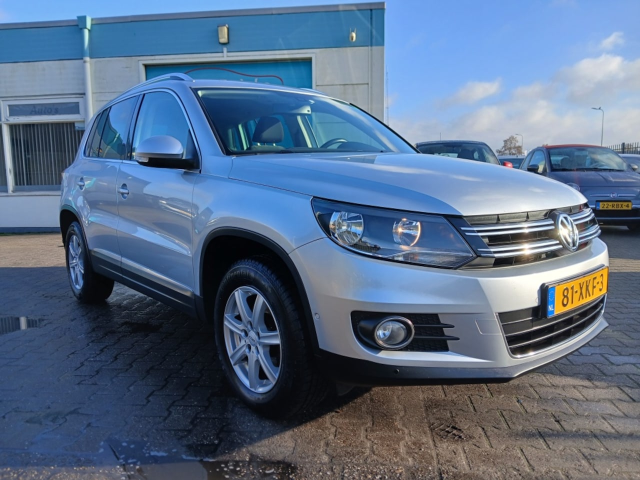 Volkswagen Tiguan - 1.4 TSI NL Auto/160PK/Dealer onderhouden - AutoWereld.nl