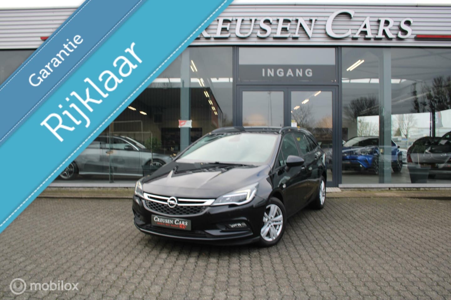 Opel Astra - 1.4 Turbo 120 Jaar Edition/Navi/Pdc/Tel/Stoelverw - AutoWereld.nl