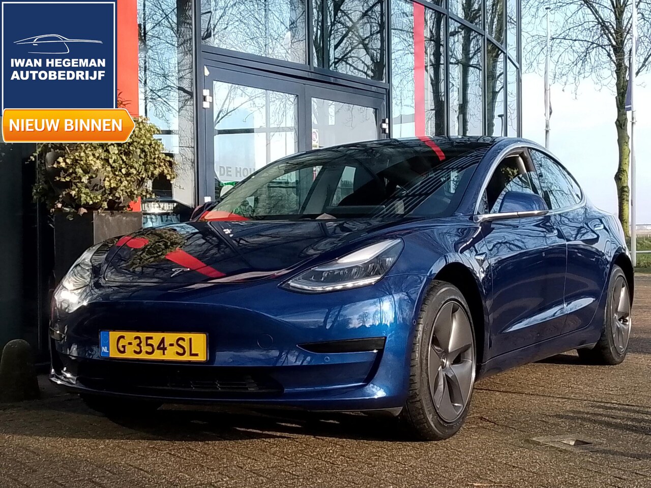 Tesla Model 3 - Standard RWD Plus 60 kWh | Panodak | Navi | ECC | PDC | Cruise Control - AutoWereld.nl