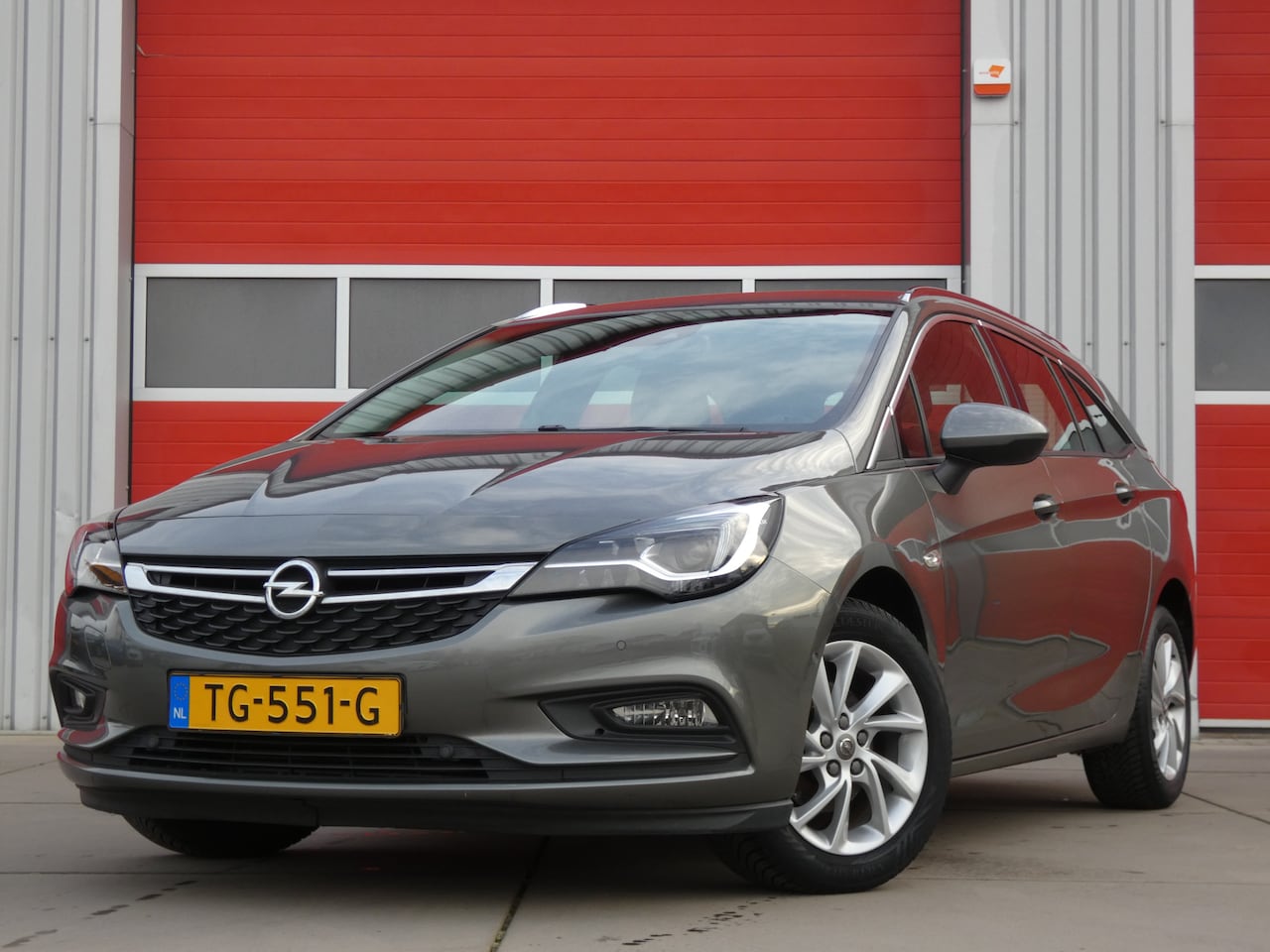 Opel Astra Sports Tourer - 1.0 Innovation/ lage km/ zeer mooi! - AutoWereld.nl