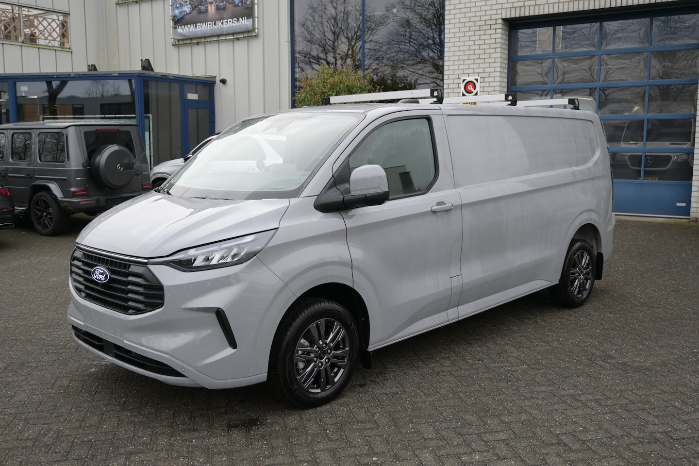 Ford Transit Custom - 320L L2 2.0 TDCI 170 pk Limited Dakdragers, Trekhaak 2500 KG, ACC, LED, Navigatie, Camera - AutoWereld.nl