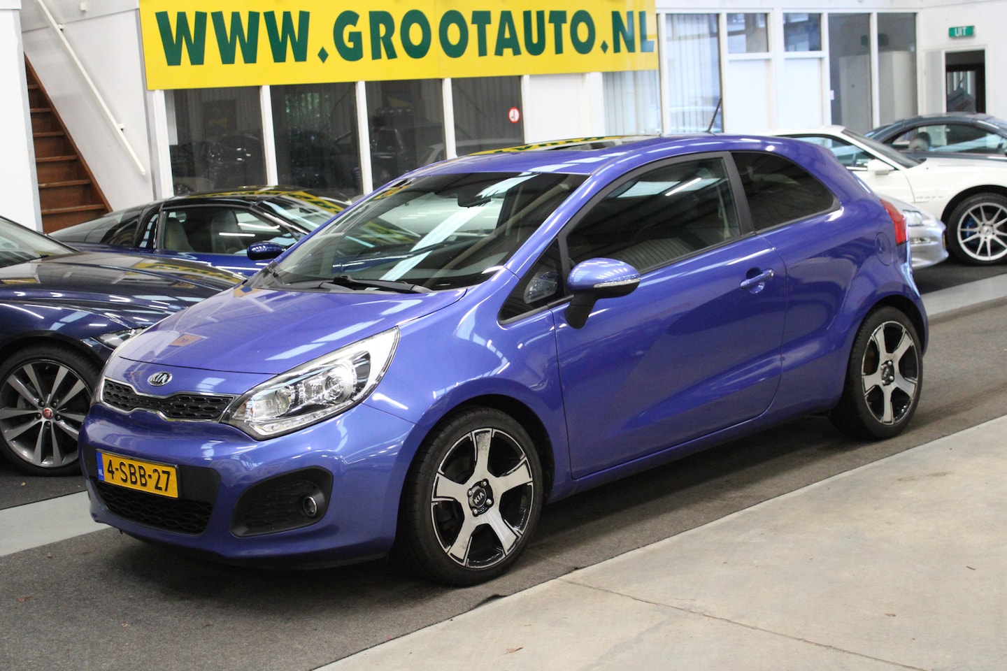 Kia Rio - 1.4 CVVT Super Pack Automaat Volledig onderhouden, Airco, Navi - AutoWereld.nl