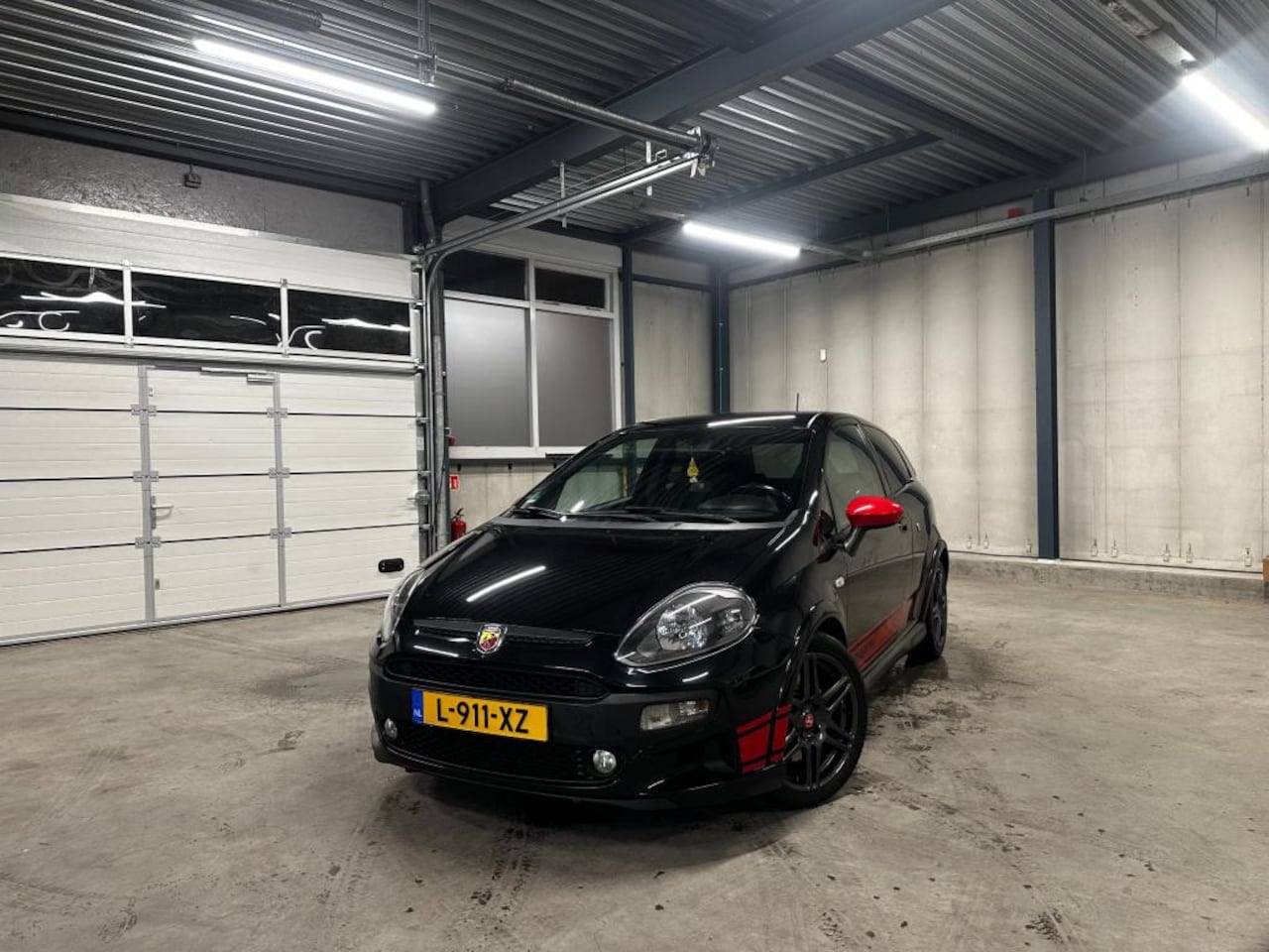 Fiat Punto Evo - 1.4 Abarth Supersport-nwe multiair-brembo-alcantara - AutoWereld.nl