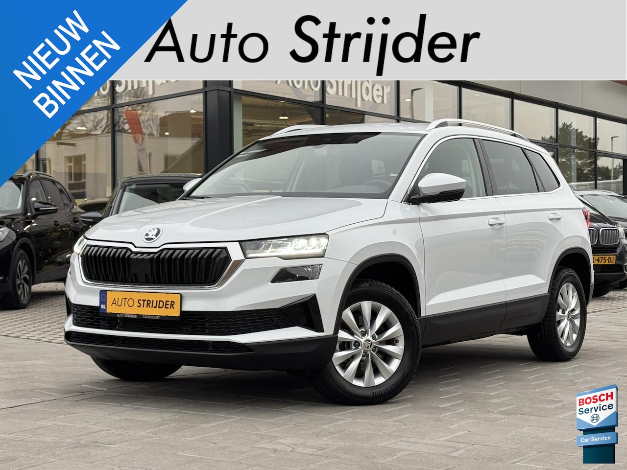 Skoda Karoq - 1.5 TSI ACT Business Edition 150pk automaat | ECC | Camera | Carplay | 16LM - AutoWereld.nl