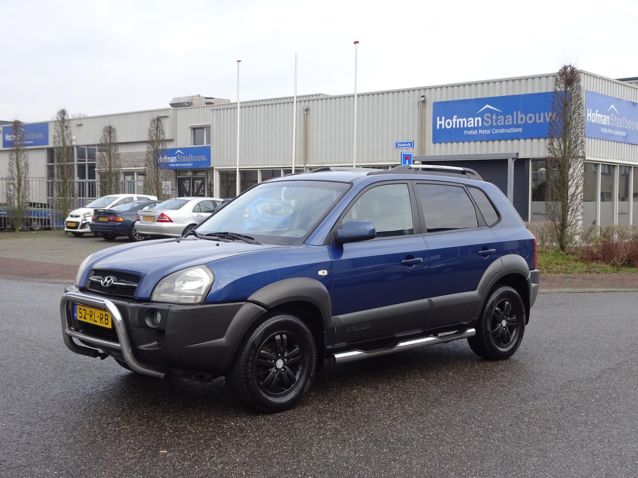 Hyundai Tucson - 2.0i Dynamic Airco Trekhaak - AutoWereld.nl