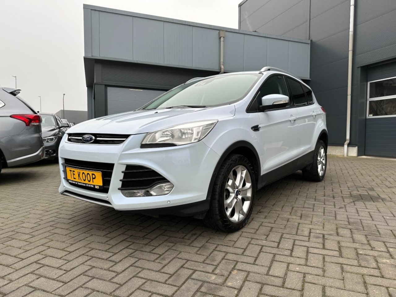 Ford Kuga - 1.6 Titanium Plus 4WD Automaat Navi Camera Trekhaak - AutoWereld.nl