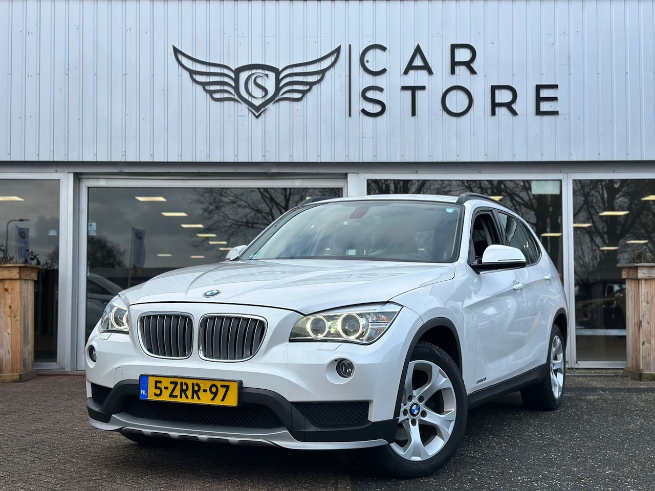 BMW X1 - sDrive20i Executive |BIXENON LED|AUT|CRUISE|CLIMA|NETTE AUTO - AutoWereld.nl