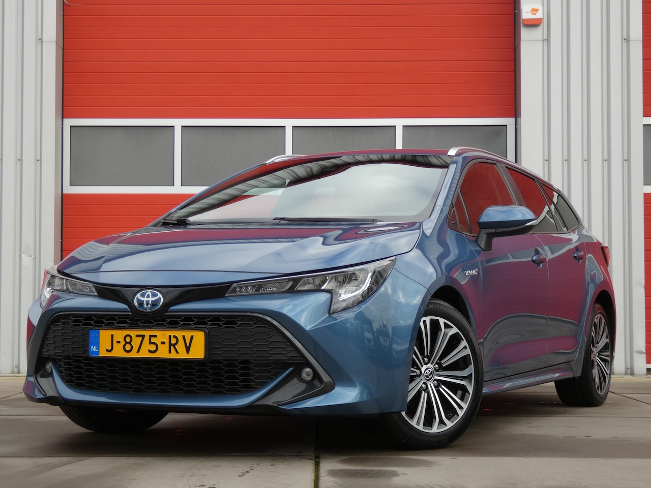 Toyota Corolla Touring Sports - 1.8 Hybrid Business Plus/ lage km/ compleet! - AutoWereld.nl