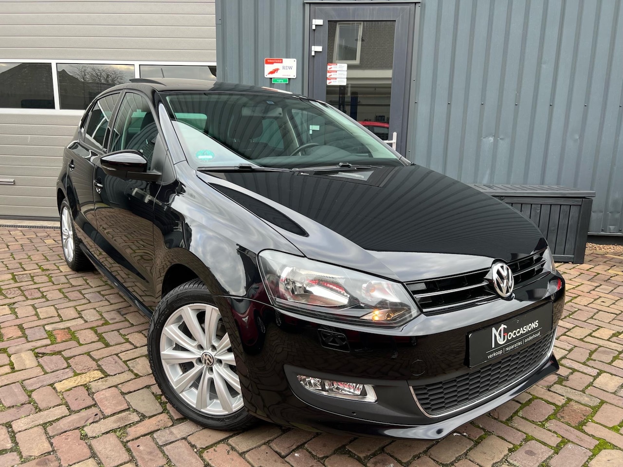 Volkswagen Polo - 1.2-12V Highline Cruise / Pano / PDC - AutoWereld.nl