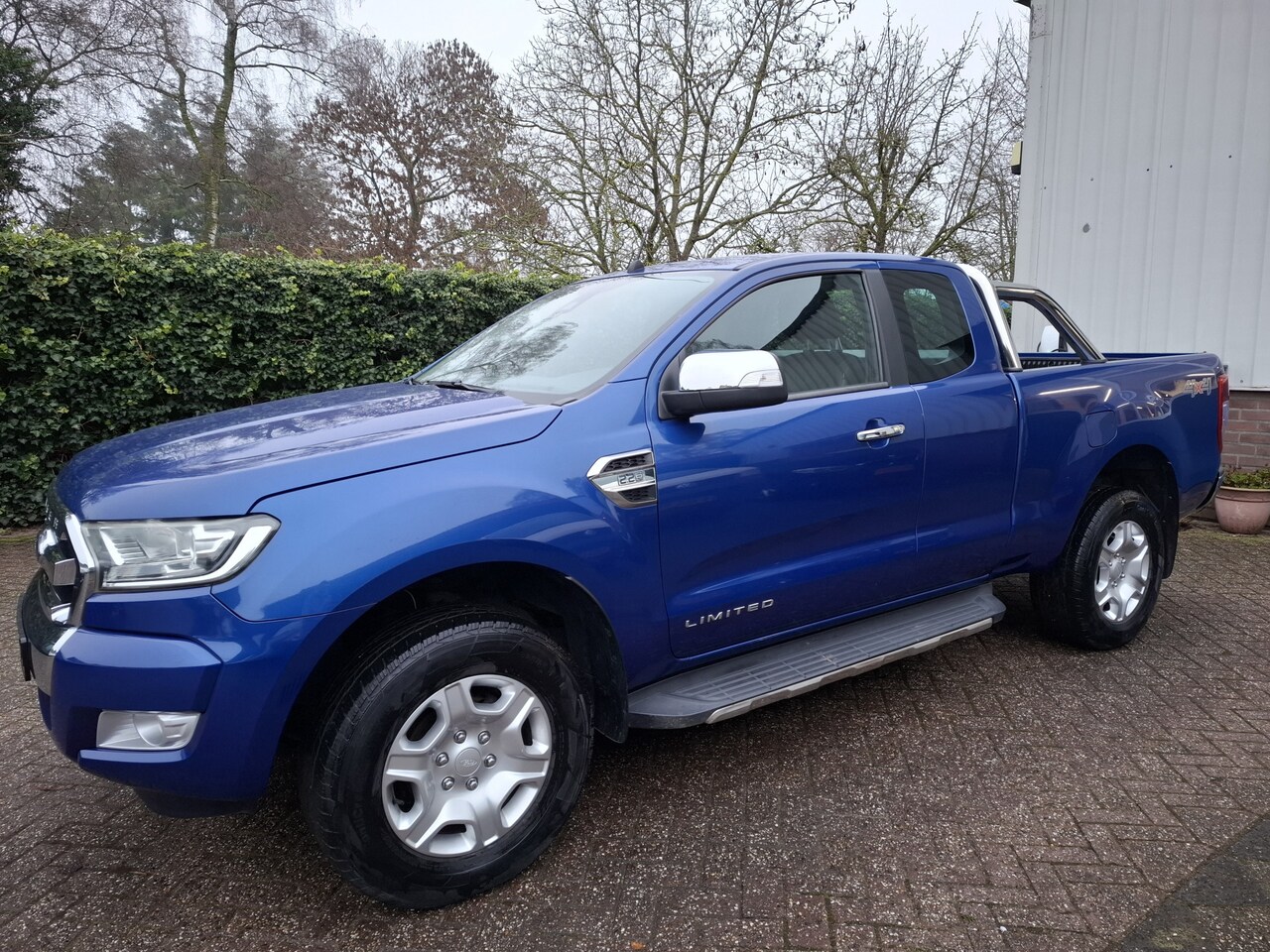 Ford Ranger - 2.2 TDCi LIMITED SUPERCAB NAVI/CLIMAT/CRUISE/4WD/LEER 160PK - AutoWereld.nl