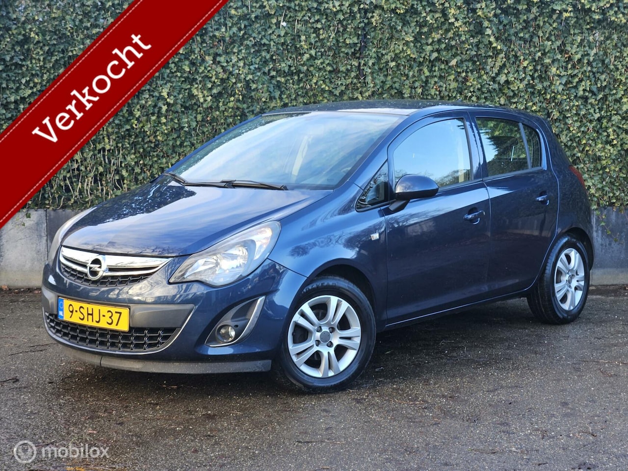 Opel Corsa - 1.4 5-Deurs | Airco | Navi | LMV - AutoWereld.nl