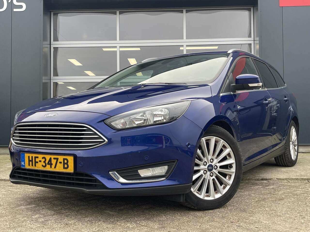 Ford Focus Wagon - 1.0 Titanium Edition | Airco | Trekhaak | Cruise Control | - AutoWereld.nl