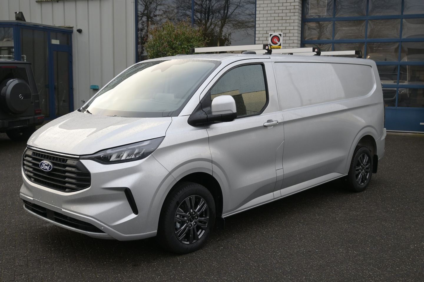 Ford Transit Custom - 320L L2 2.0 TDCI 170 pk Limited Dakdragers, Trekhaak 2500 KG, ACC, LED, Navigatie, Camera - AutoWereld.nl