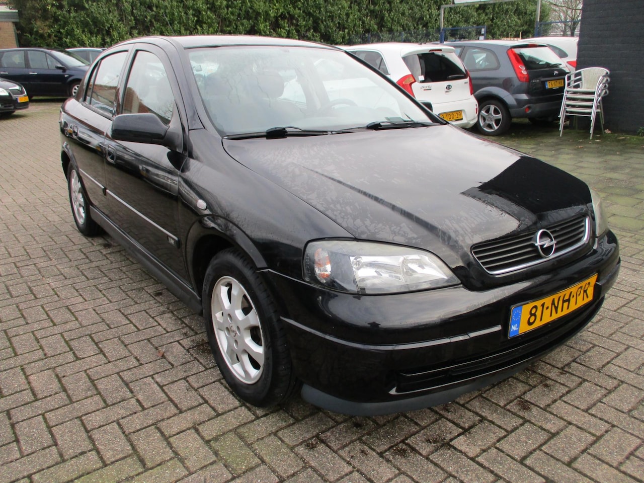 Opel Astra - 1.6-16V 90DKM! AIRCO! CRUISE! APK 10-2025! - AutoWereld.nl