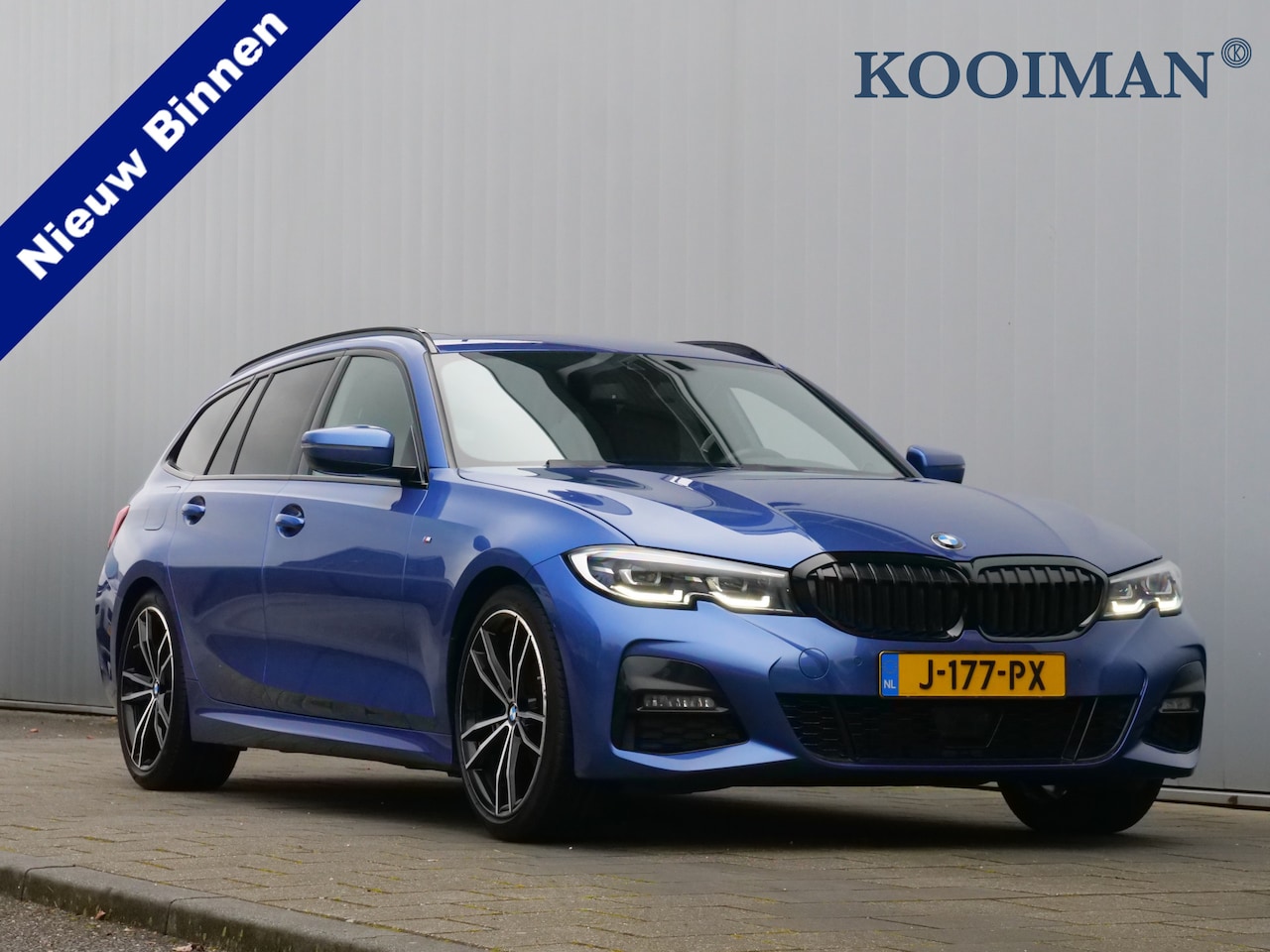 BMW 3-serie Touring - 320d 191pk High Executive Automaat M-Sport / Panoramadak / Camera / Trekhaak - AutoWereld.nl