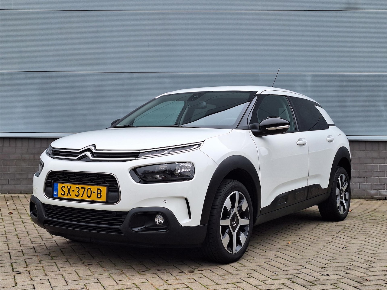 Citroën C4 Cactus - 1.2 PureTech 110pk Shine | Navigatie | Climate Control | Achteruitrijcamera | Parkeersenso - AutoWereld.nl