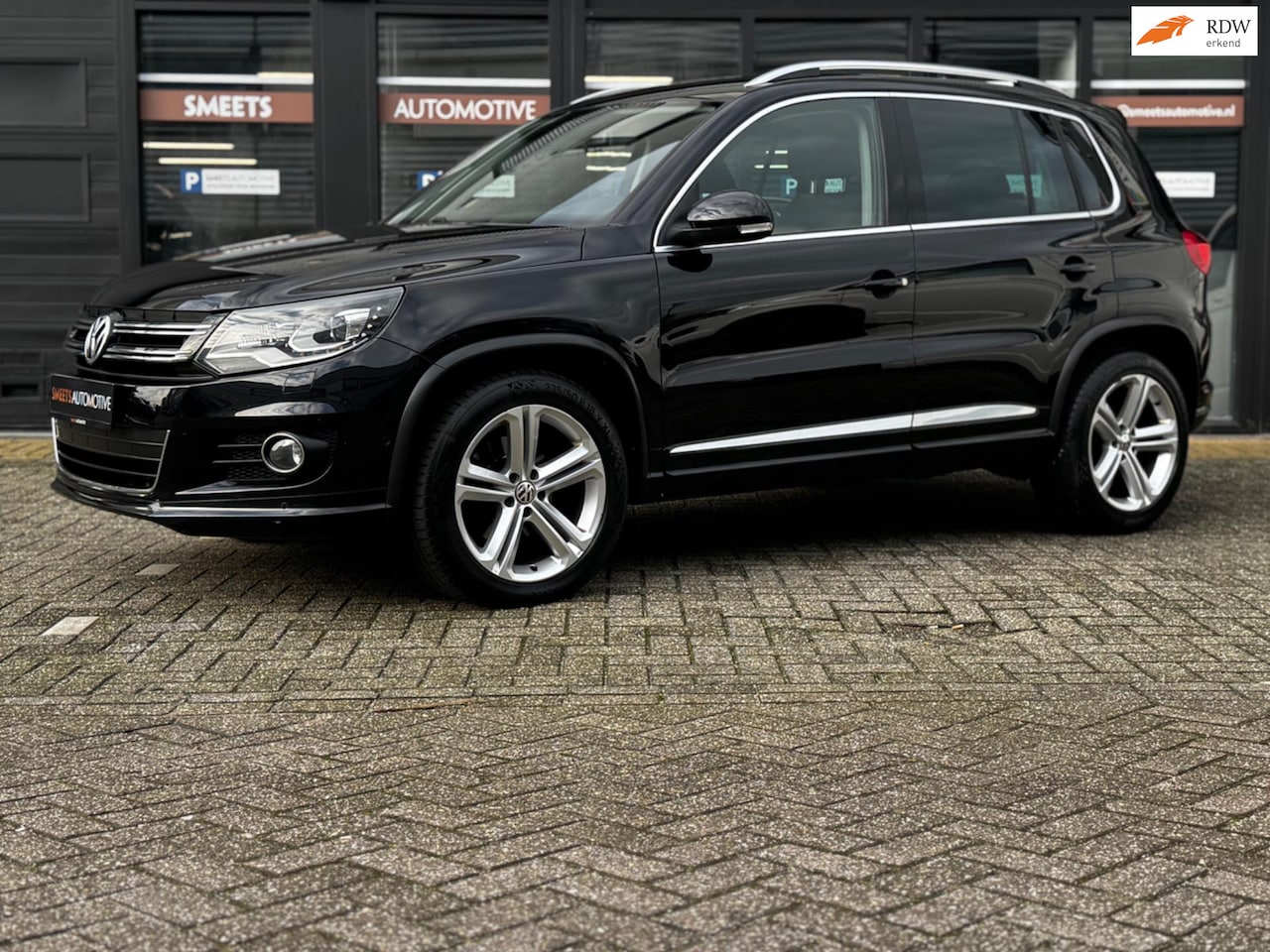 Volkswagen Tiguan - 2.0 TSI Sport&Style 4Motion - AutoWereld.nl