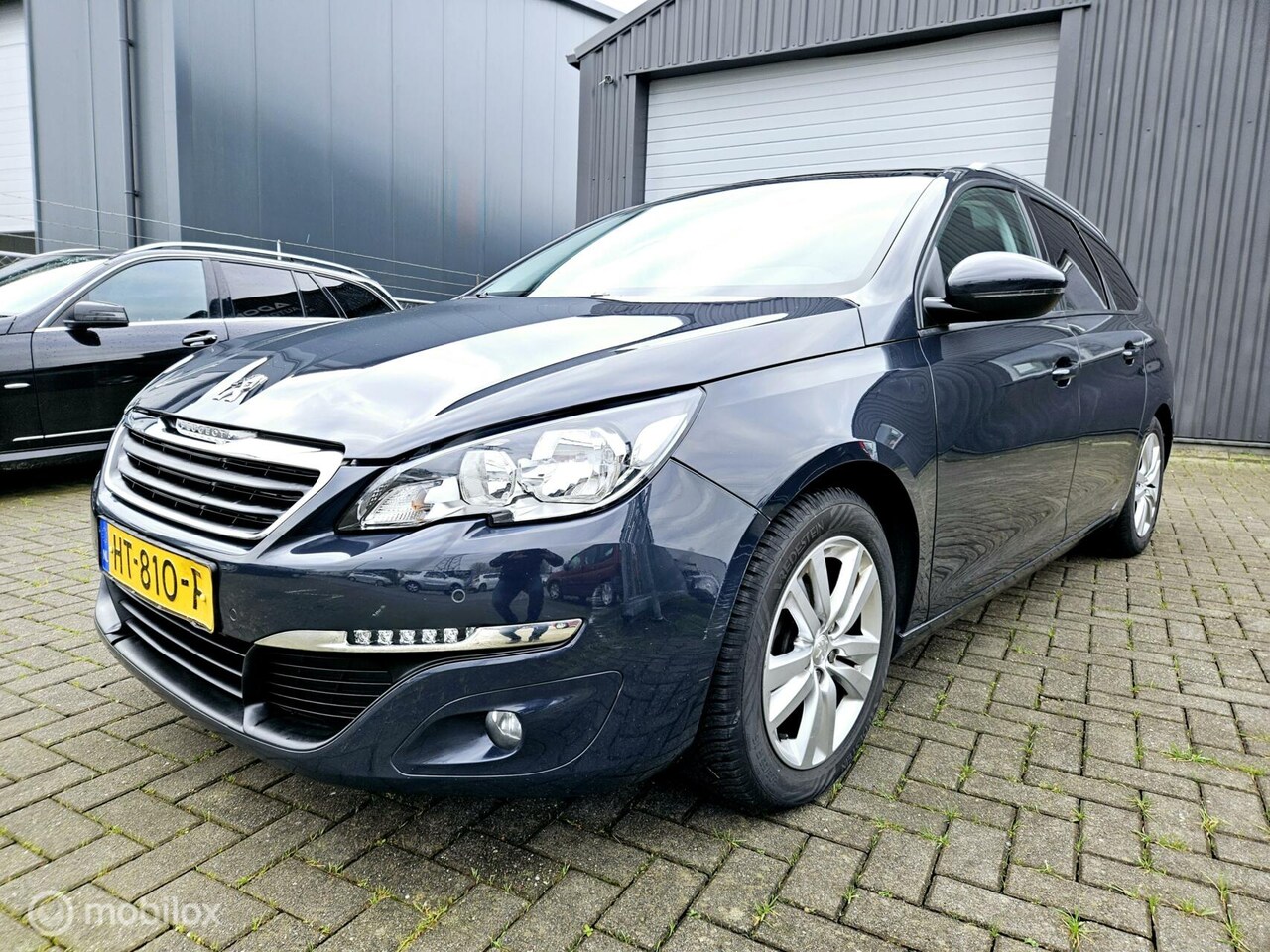 Peugeot 308 SW - 1.2 PureTech Blue Lease Executive MET NIEUW MOTOR - AutoWereld.nl