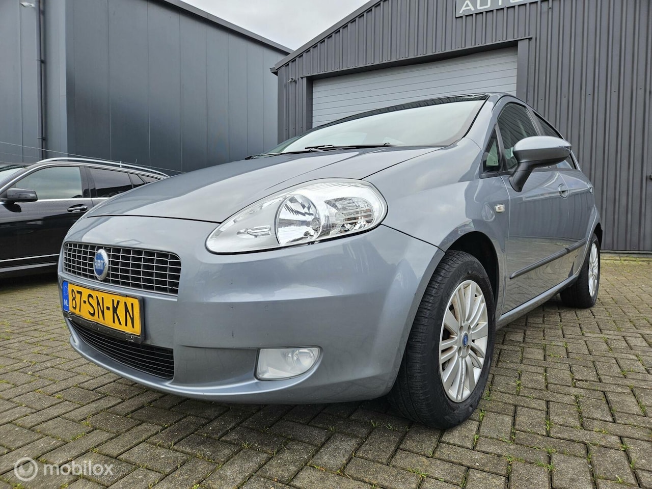 Fiat Grande Punto - 1.4 Edizione Prima AIRCO/Cruise APK 03/2026 VASTEPRIJS - AutoWereld.nl