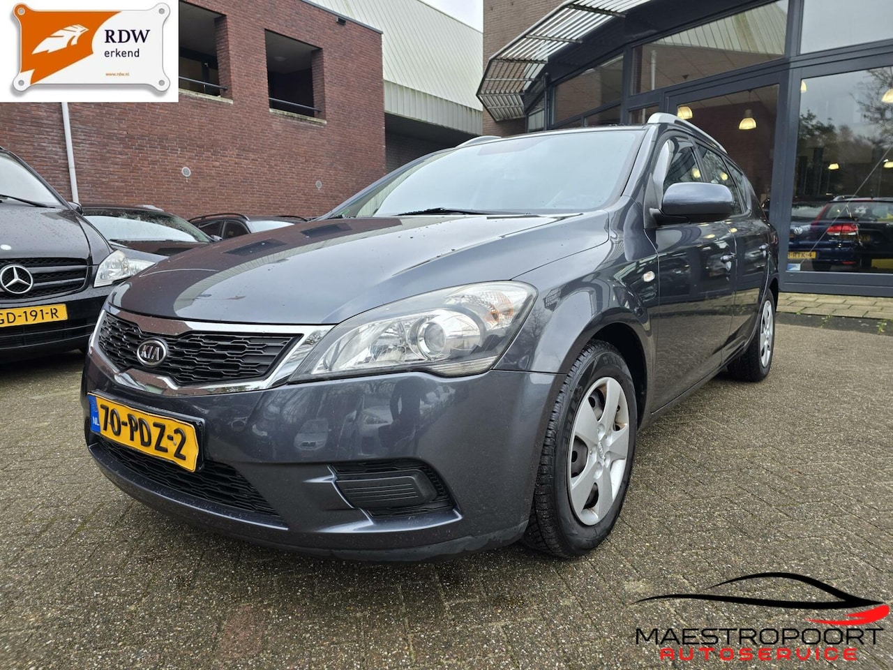 Kia Cee'd Sporty Wagon - 1.4 CVVT X-tra 1.4 CVVT X-tra - AutoWereld.nl