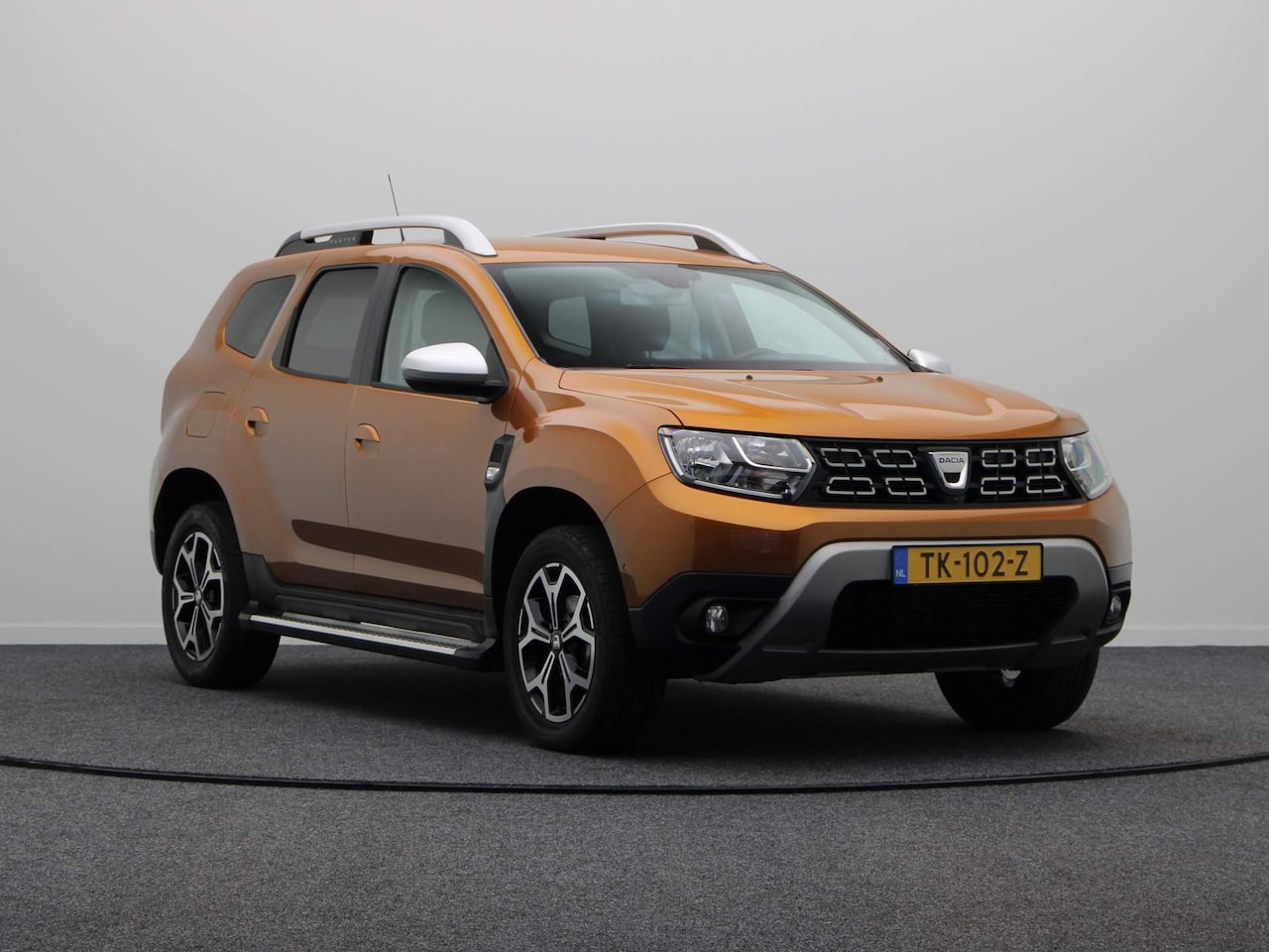 Dacia Duster - TCe 125pk Prestige | Dealer onderhouden | Sidesteps | Trekhaak | Airco | - AutoWereld.nl