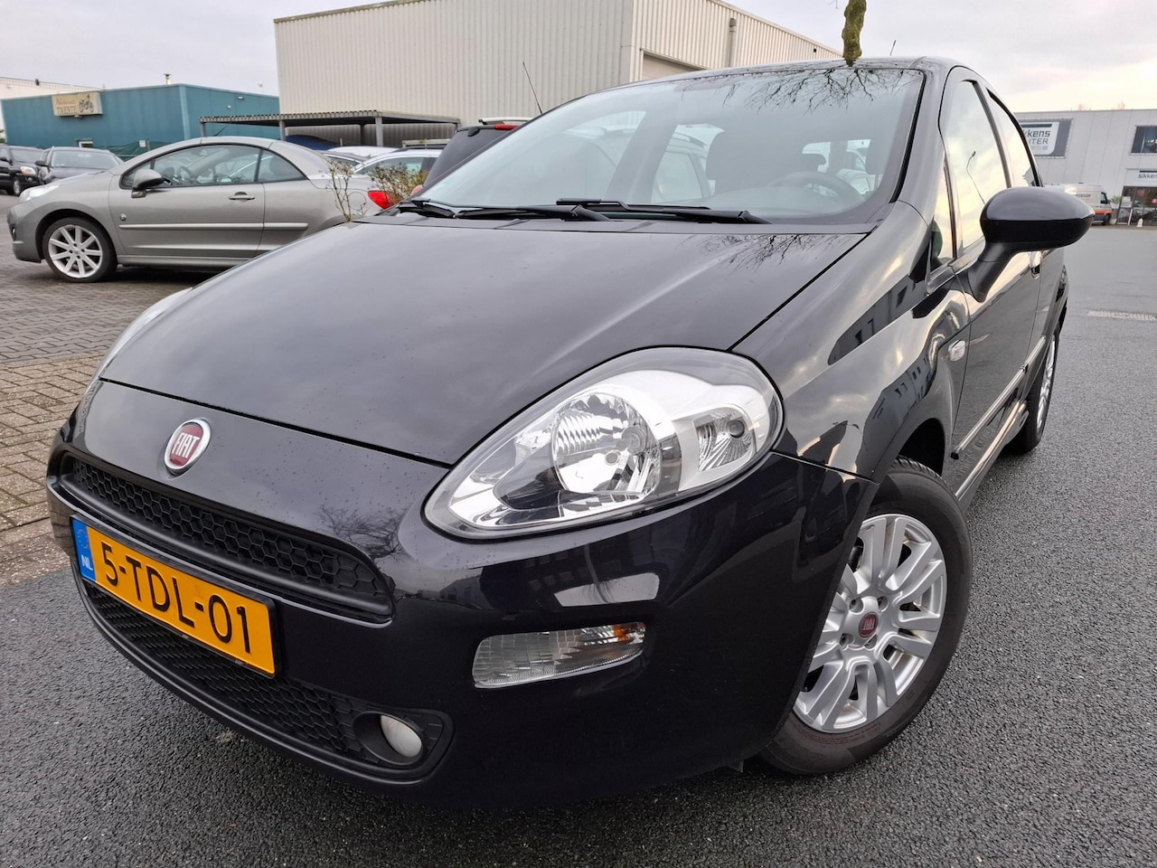 Fiat Punto Evo - 1.3 M-Jet Edizione Cool AIRCO/CRUISE/5 DEURS! - AutoWereld.nl