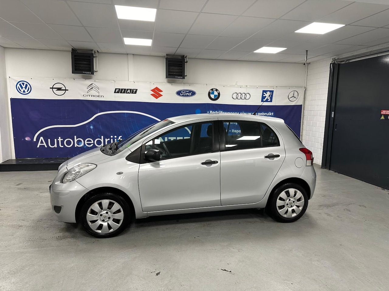 Toyota Yaris - 1.0 VVTi Cool 1.0 VVTi Cool - AutoWereld.nl