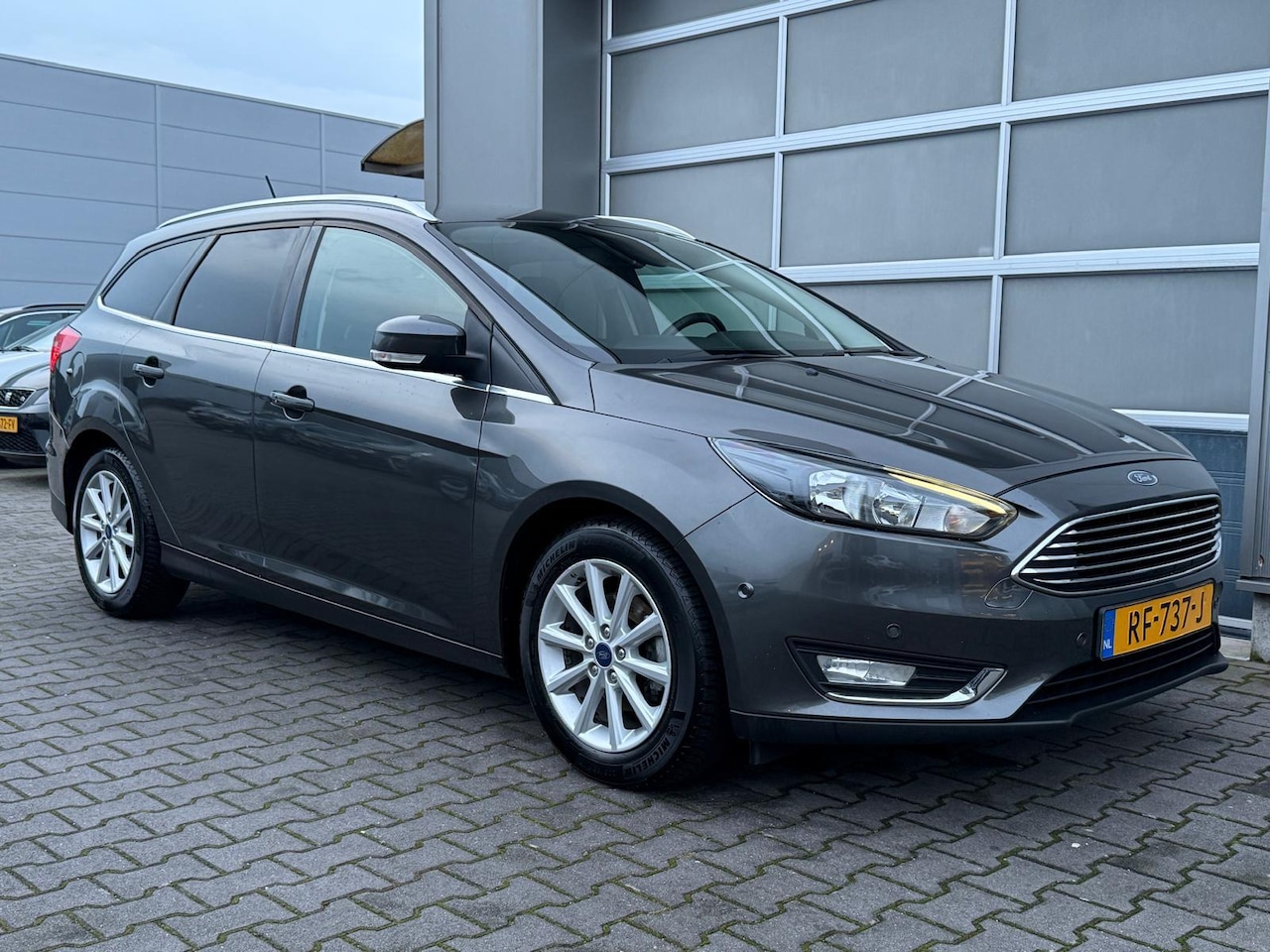 Ford Focus Wagon - 1.5 TDCI Titanium|Navi|Carplay|Cruise|PDC|Trekhaak - AutoWereld.nl