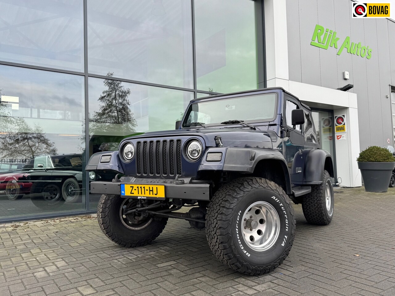 Jeep Wrangler - 2.5i Softtop + Hardtop - AutoWereld.nl