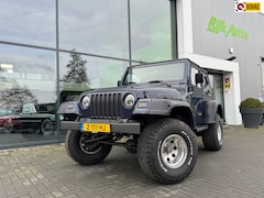 Jeep Wrangler - 2.5i Softtop + Hardtop